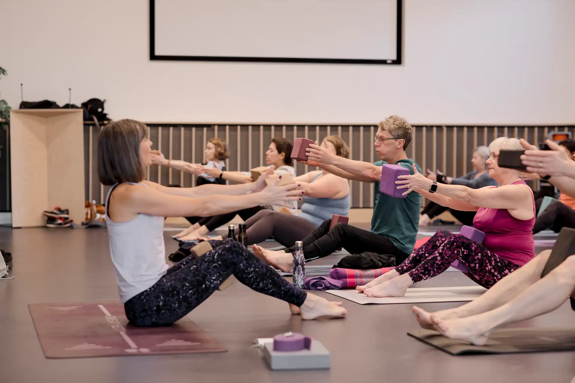 Group Pilates class focusing on core strength and flexibility.